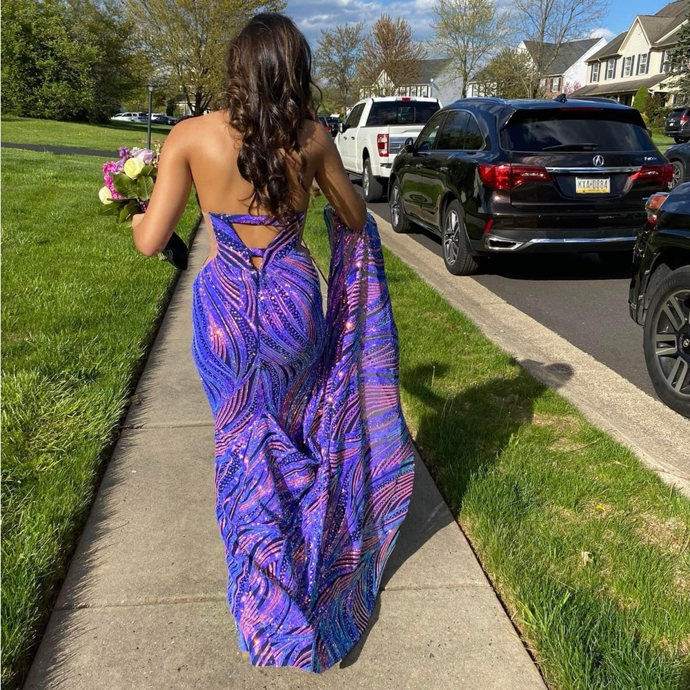 One of a kind dress. Will not find in stores.